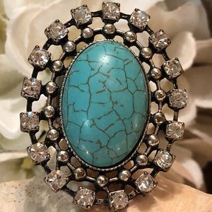 Turquoise colored and rhinestone ring